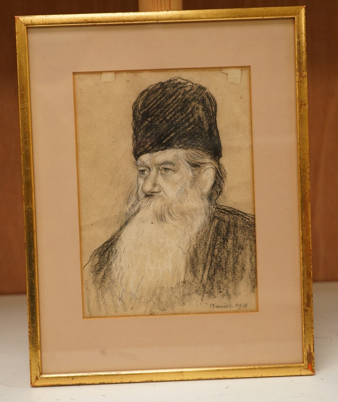 Marnick, heightened charcoal, Portrait of a bearded Russian gentleman, signed and dated 1908, 22.5 x 16cm. Condition - poor